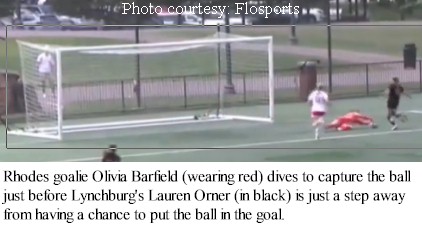 Olivia Barfield captures ball before striker gets there