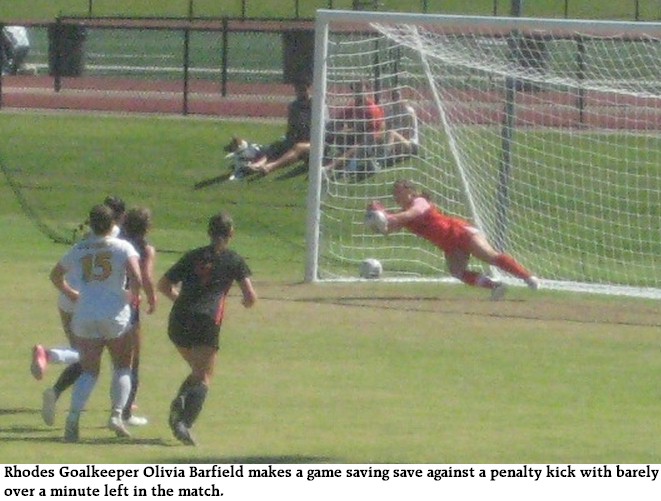 Oliva Barfield dives to make win saving save. Rhodes vs. Centre